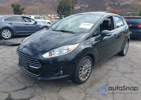2014 Ford Fiesta Titanium из США, поврежденный, VIN 3FADP4FJ4EM206114